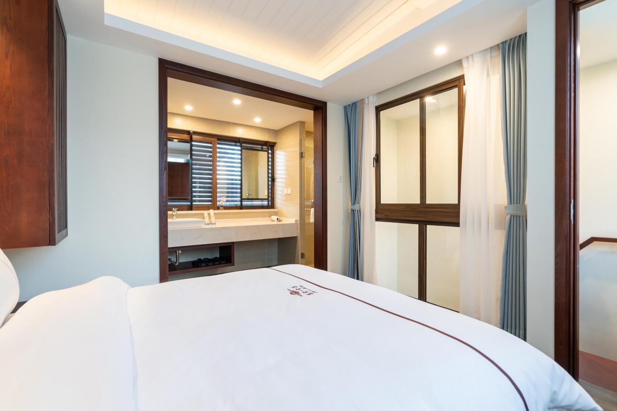 Iccssi Villa Haitang Bay Sanya Buitenkant foto